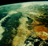 Color oblique photograph (taken by an astronaut) of the Gulf of California showing part of southern California and areas south of the border with Mexico.