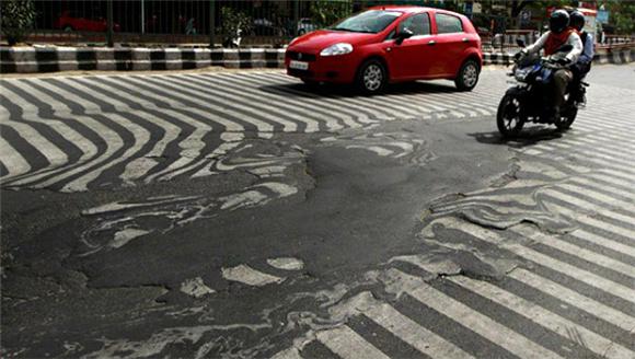 A street in New Delhi, India has melted in the heat